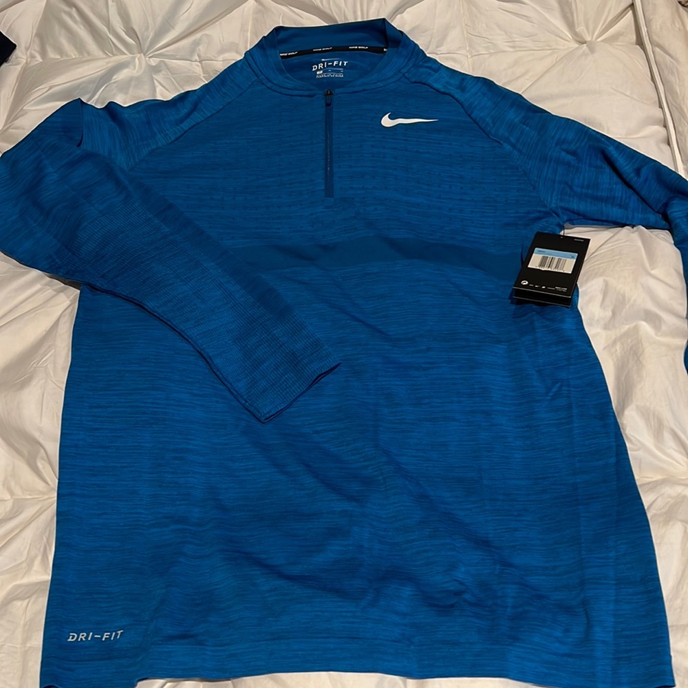 Nike Golf Dri-Fit 1/4 zip pullover. New with tags. Men’s size medium bright blue